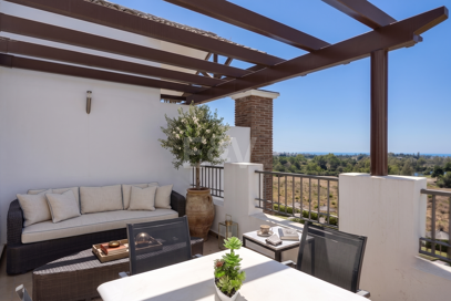 Frontline Golf Penthouse with Expansive Solarium and Sea Views
