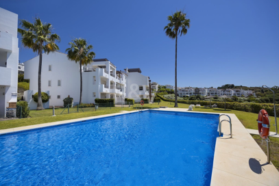 Frontline Golf Penthouse with Expansive Solarium and Sea Views