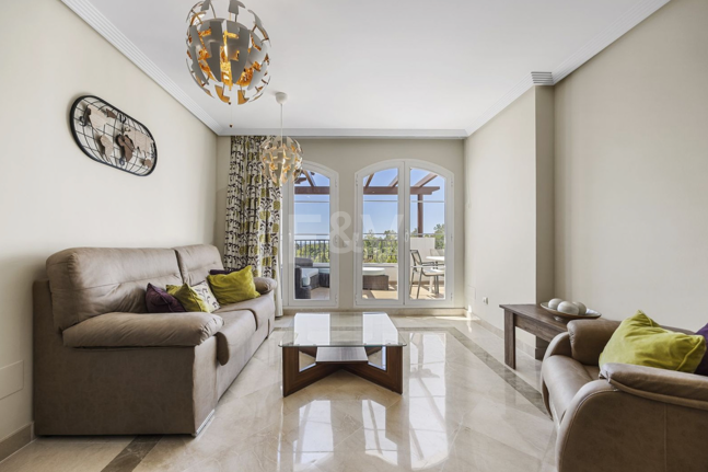 Frontline Golf Penthouse with Expansive Solarium and Sea Views