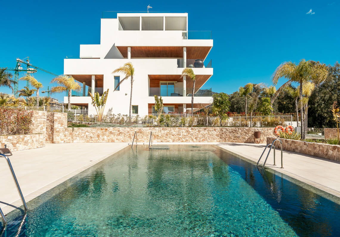 Elegant Triplex Residence with Private Garden and Pool Just Steps from the Beach on the Golden Mile