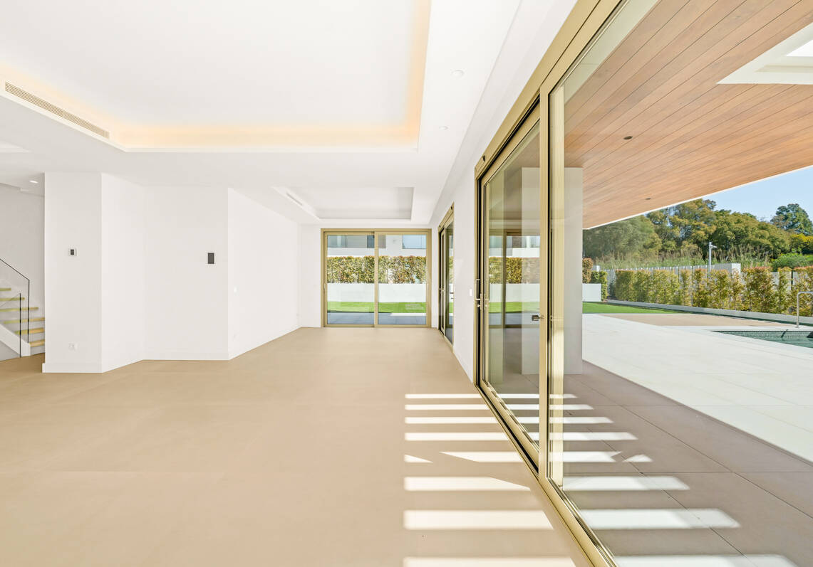 Elegant Triplex Residence with Private Garden and Pool Just Steps from the Beach on the Golden Mile