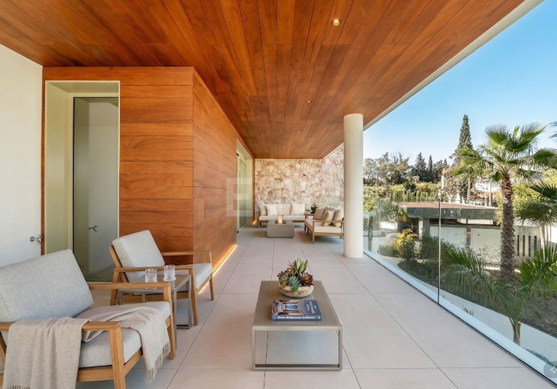 Elegant Triplex Residence with Private Garden and Pool Just Steps from the Beach on the Golden Mile