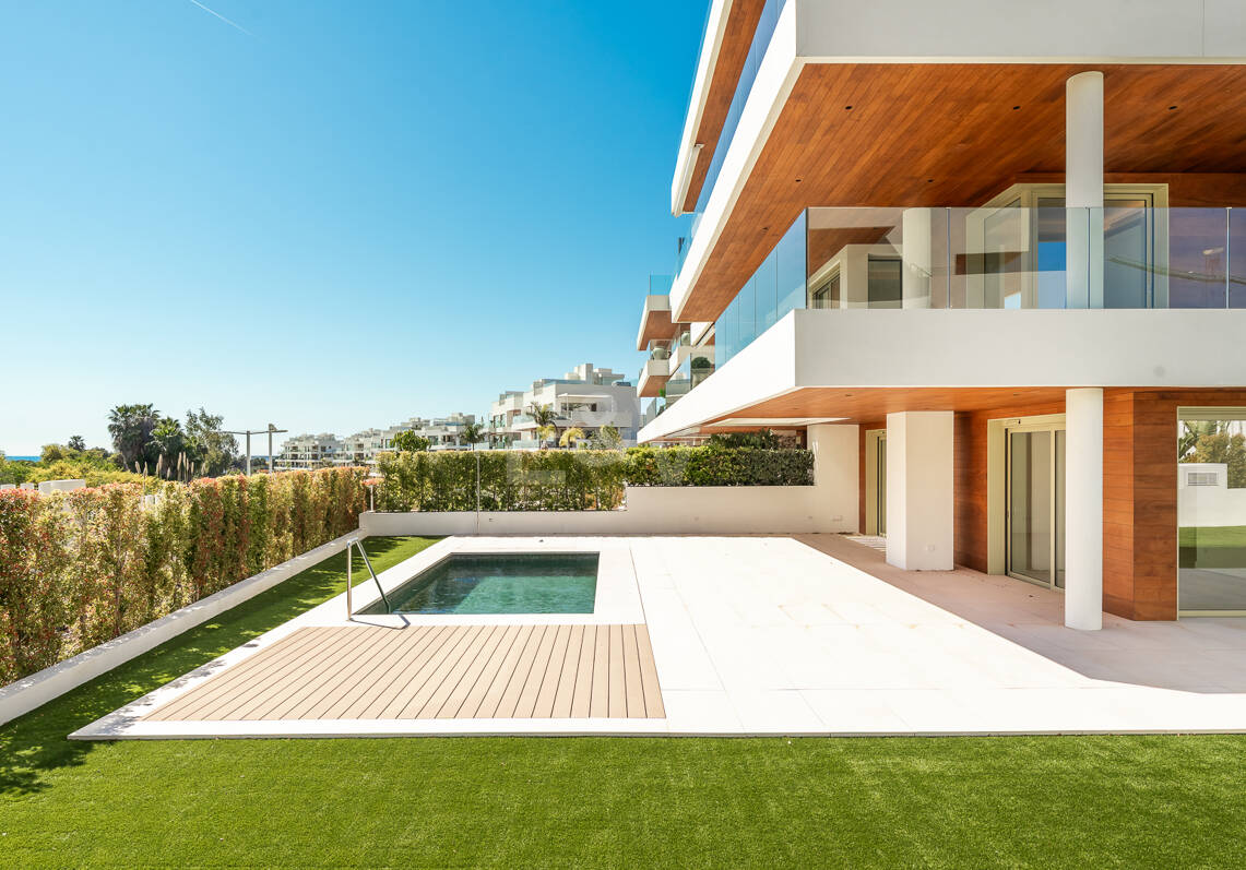 Elegant Triplex Residence with Private Garden and Pool Just Steps from the Beach on the Golden Mile