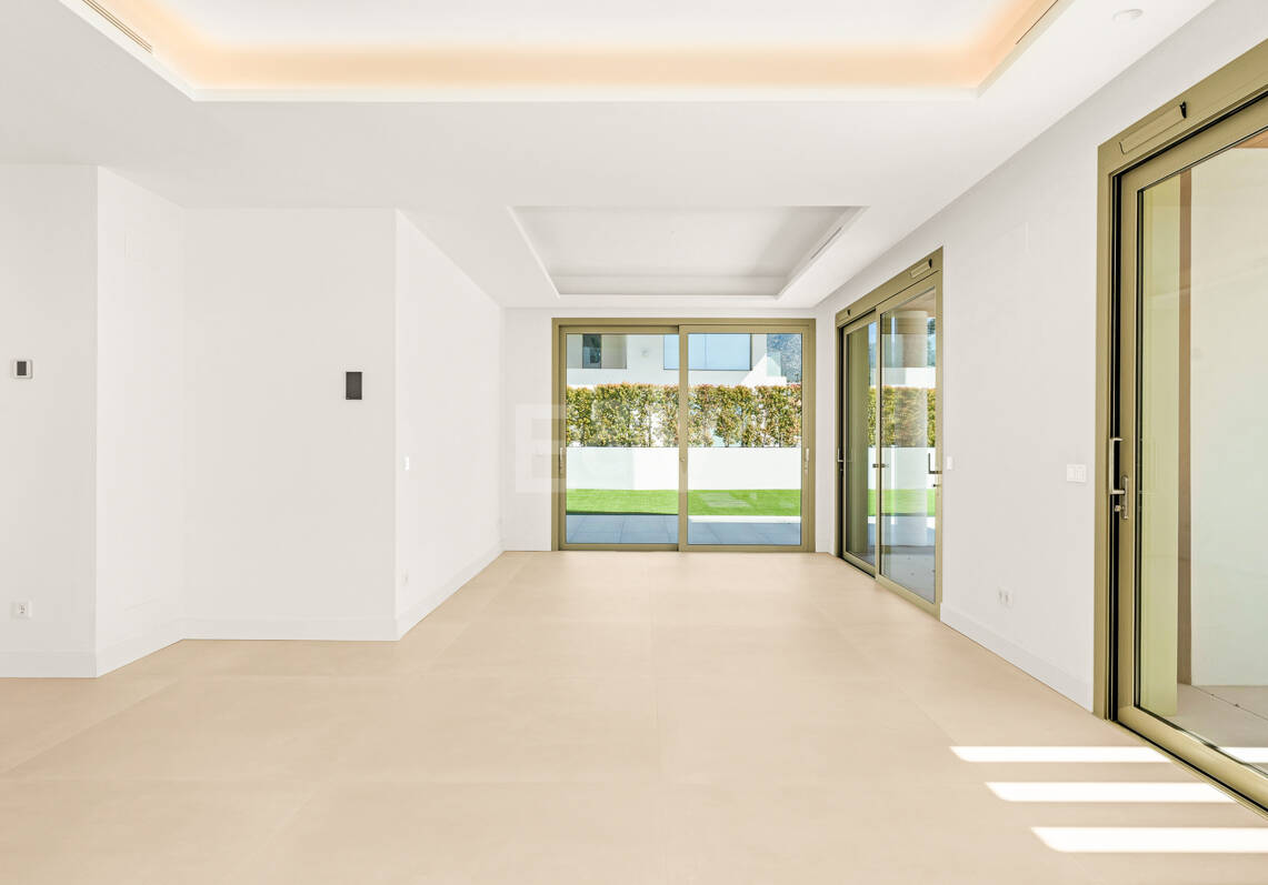 Elegant Triplex Residence with Private Garden and Pool Just Steps from the Beach on the Golden Mile