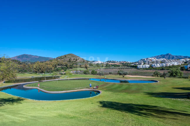 Golfside erhöhtes Erdgeschoss-Apartment mit Bergblick und Resort-ähnlichen Annehmlichkeiten