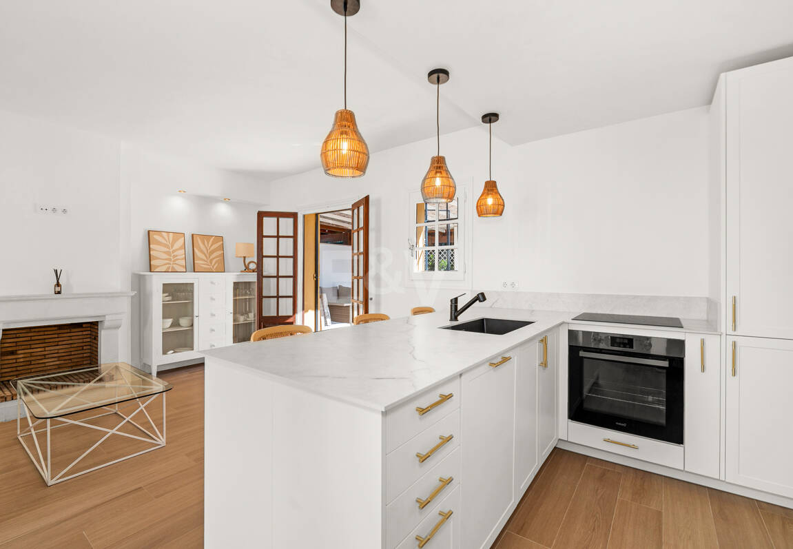 Casa adosada andaluza refinada a pasos de la playa en un entorno exclusivo