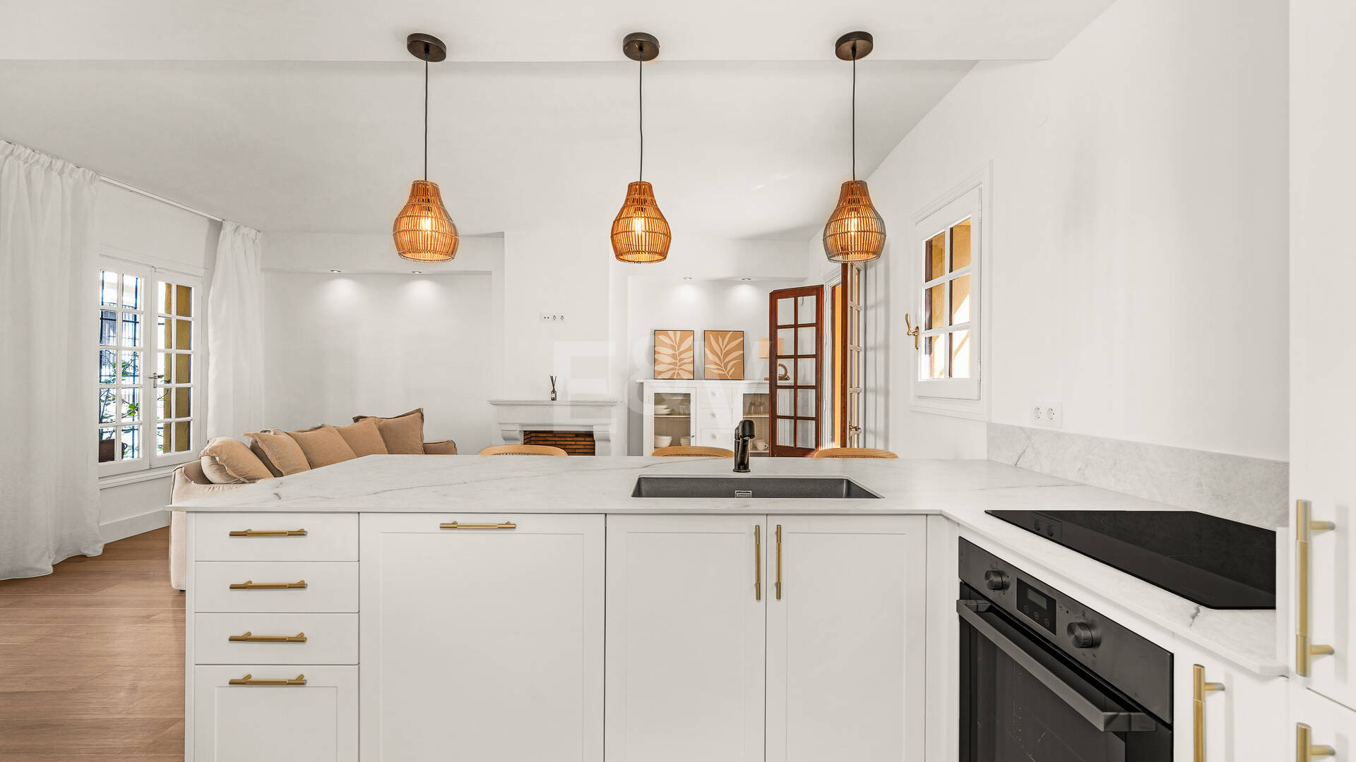 Refined Andalusian Townhouse Steps from the Beach in an Exclusive Setting