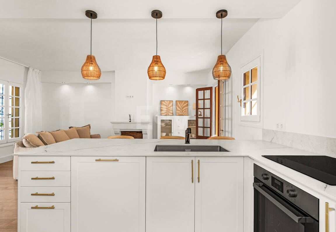 Casa adosada andaluza refinada a pasos de la playa en un entorno exclusivo