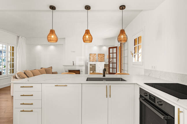 Casa adosada andaluza refinada a pasos de la playa en un entorno exclusivo