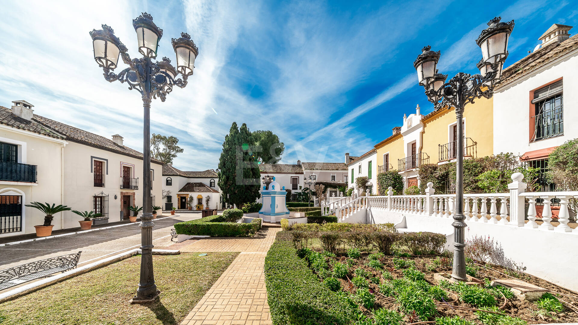 Refined Andalusian Townhouse Steps from the Beach in an Exclusive Setting
