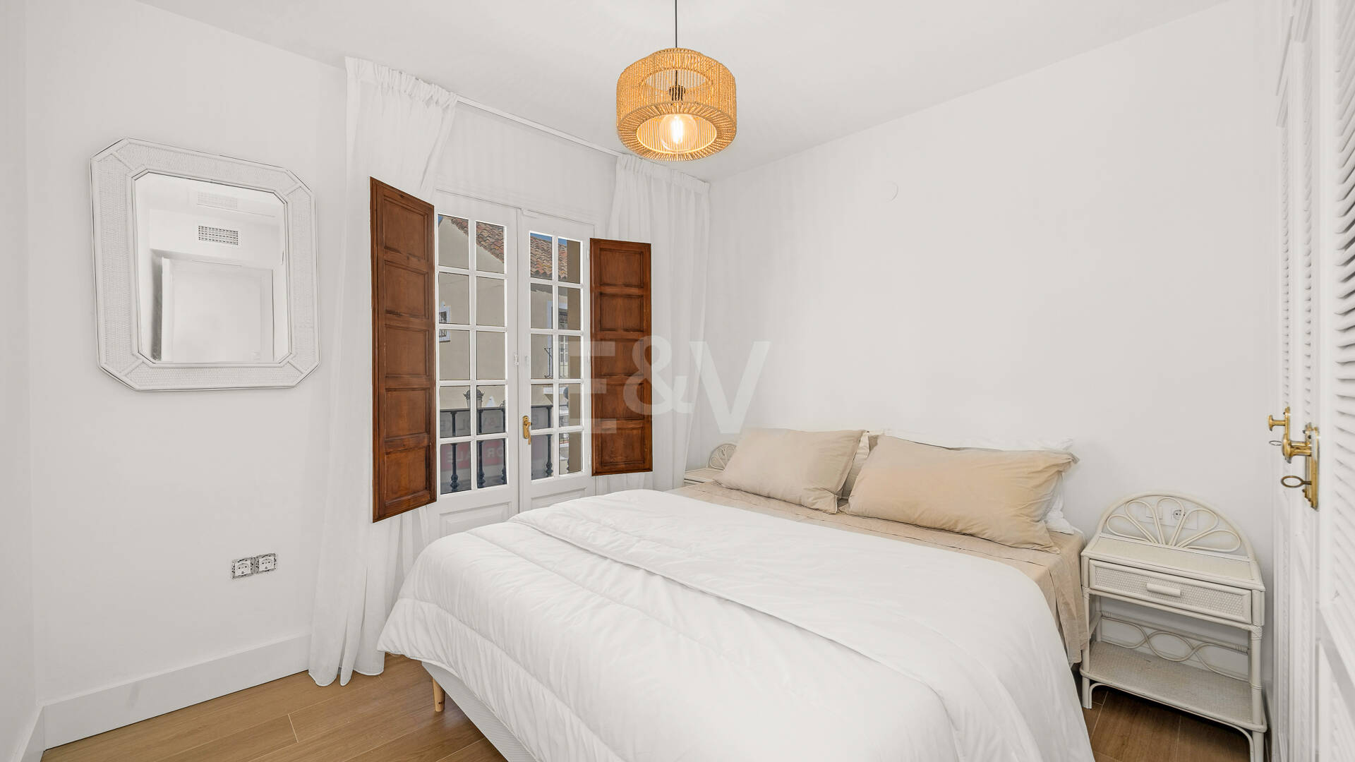 Refined Andalusian Townhouse Steps from the Beach in an Exclusive Setting