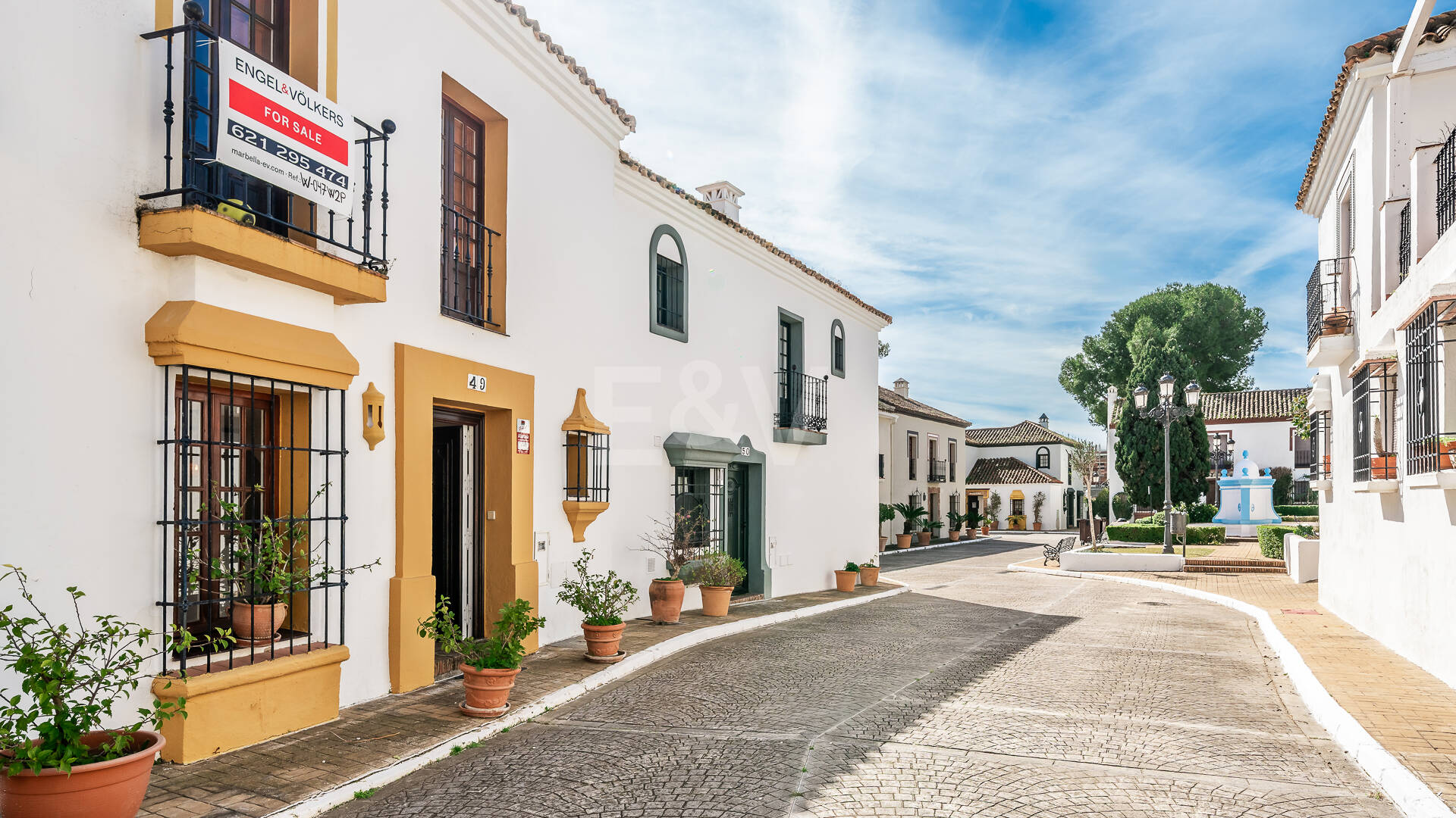 Refined Andalusian Townhouse Steps from the Beach in an Exclusive Setting