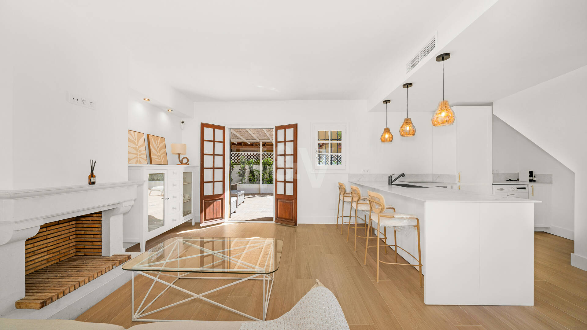 Refined Andalusian Townhouse Steps from the Beach in an Exclusive Setting