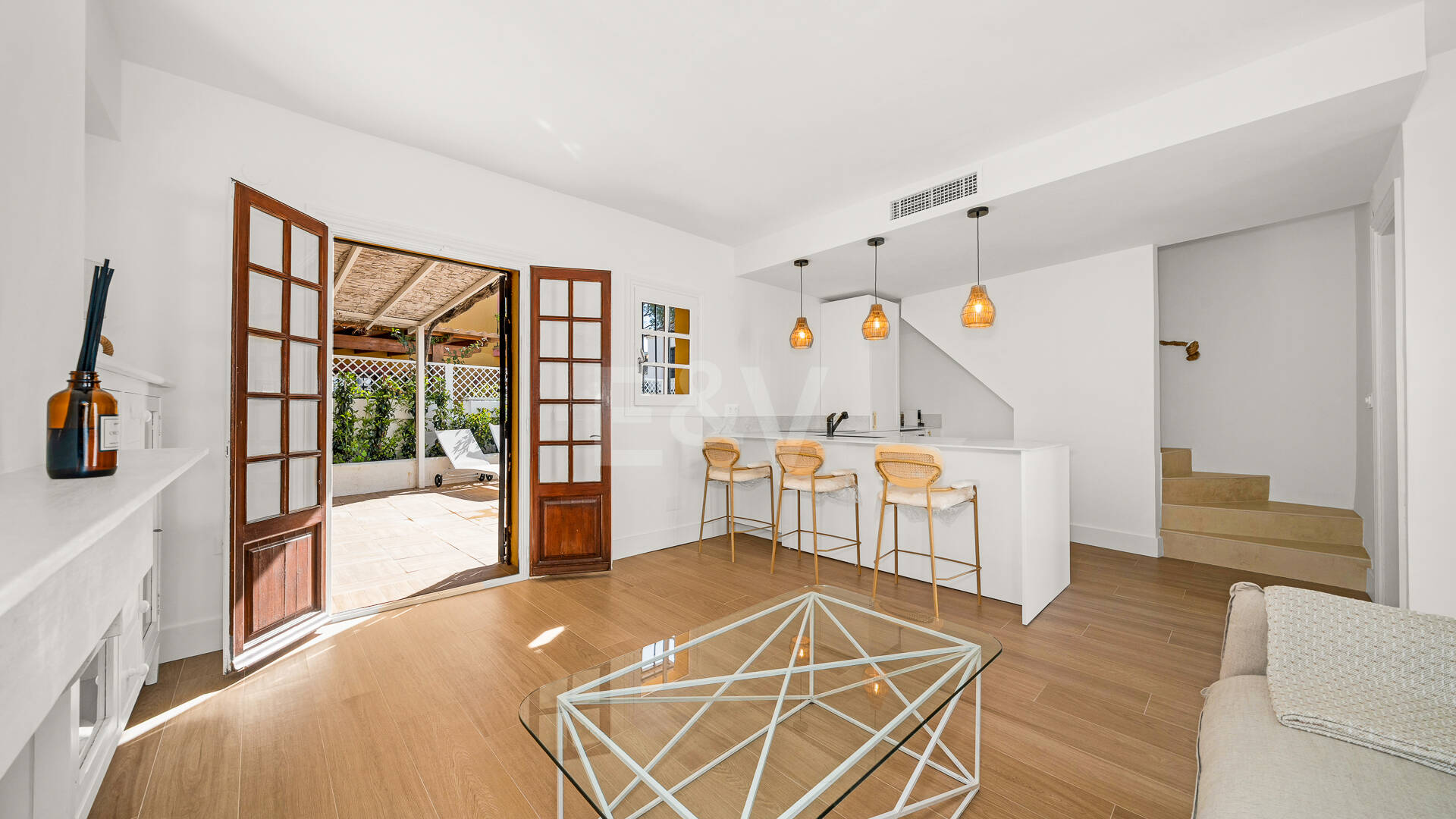 Refined Andalusian Townhouse Steps from the Beach in an Exclusive Setting