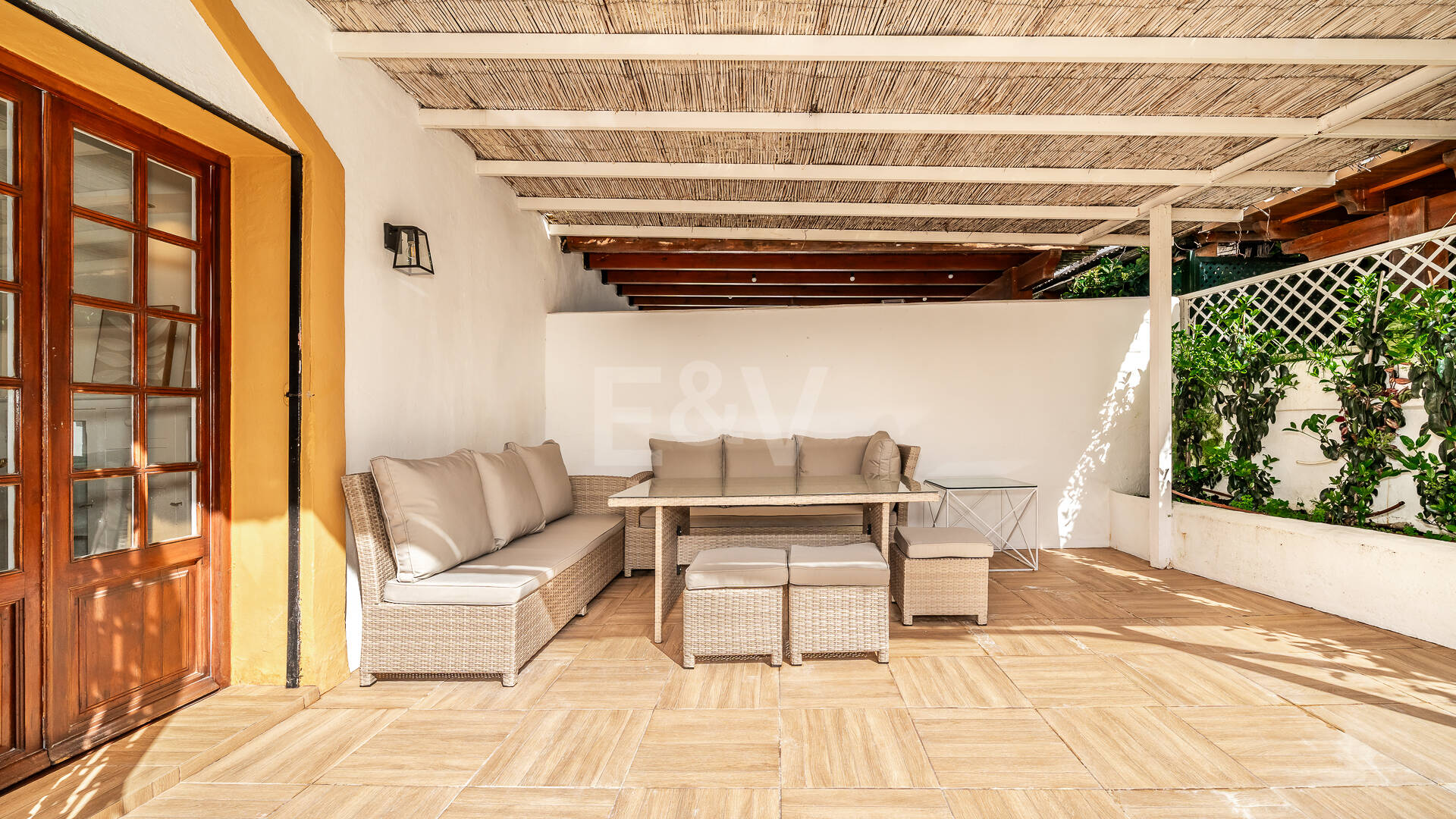 Refined Andalusian Townhouse Steps from the Beach in an Exclusive Setting