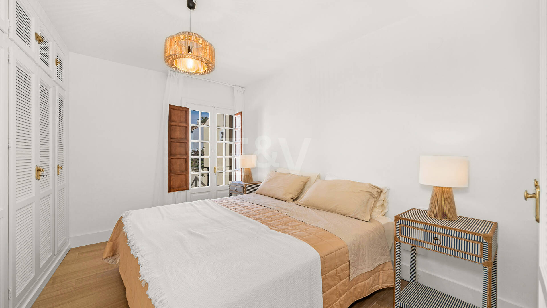 Refined Andalusian Townhouse Steps from the Beach in an Exclusive Setting