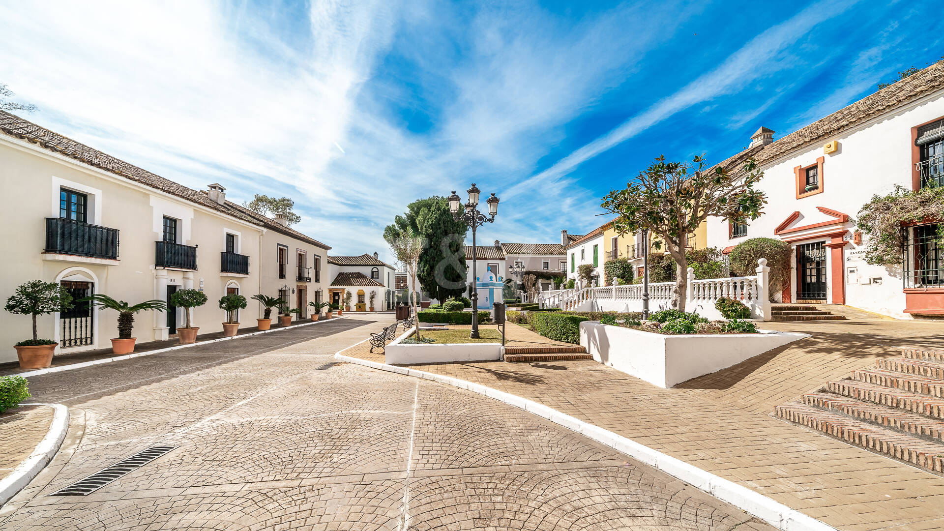 Refined Andalusian Townhouse Steps from the Beach in an Exclusive Setting