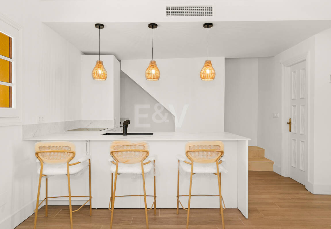 Casa adosada andaluza refinada a pasos de la playa en un entorno exclusivo