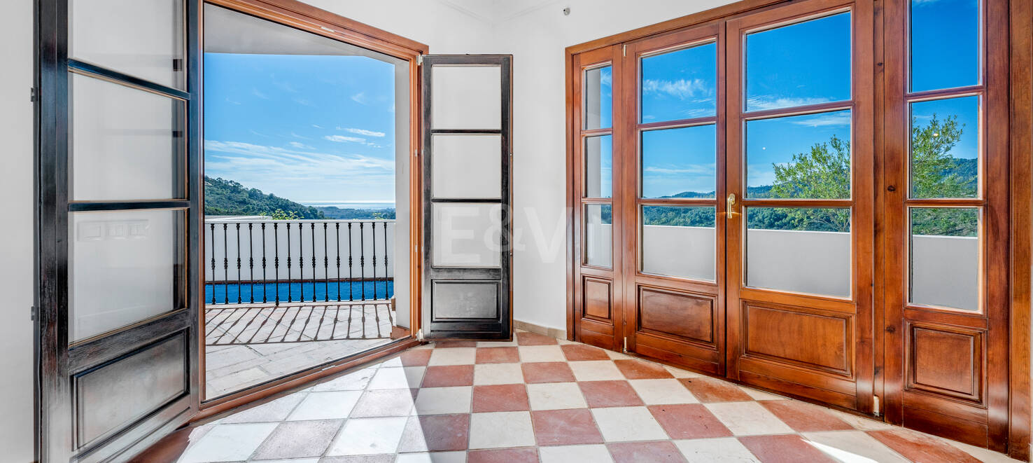 Charming Andalusian Townhouse with Breathtaking Sea and Mountain Vistas