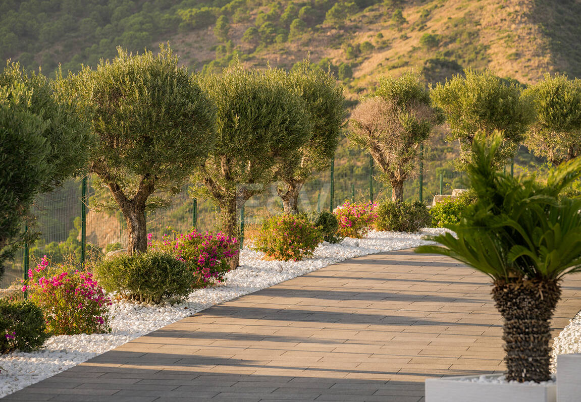 Architectural Masterpiece with Spectacular Sea and Mountain Views