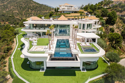 Architectural Masterpiece with Spectacular Sea and Mountain Views