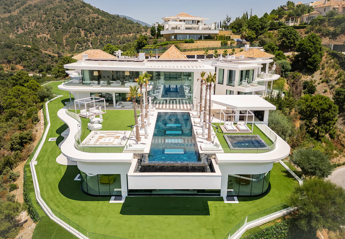 Architectural Masterpiece with Spectacular Sea and Mountain Views