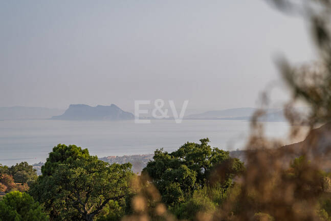 Architectural Masterpiece with Spectacular Sea and Mountain Views