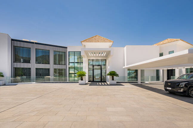 Architectural Masterpiece with Spectacular Sea and Mountain Views