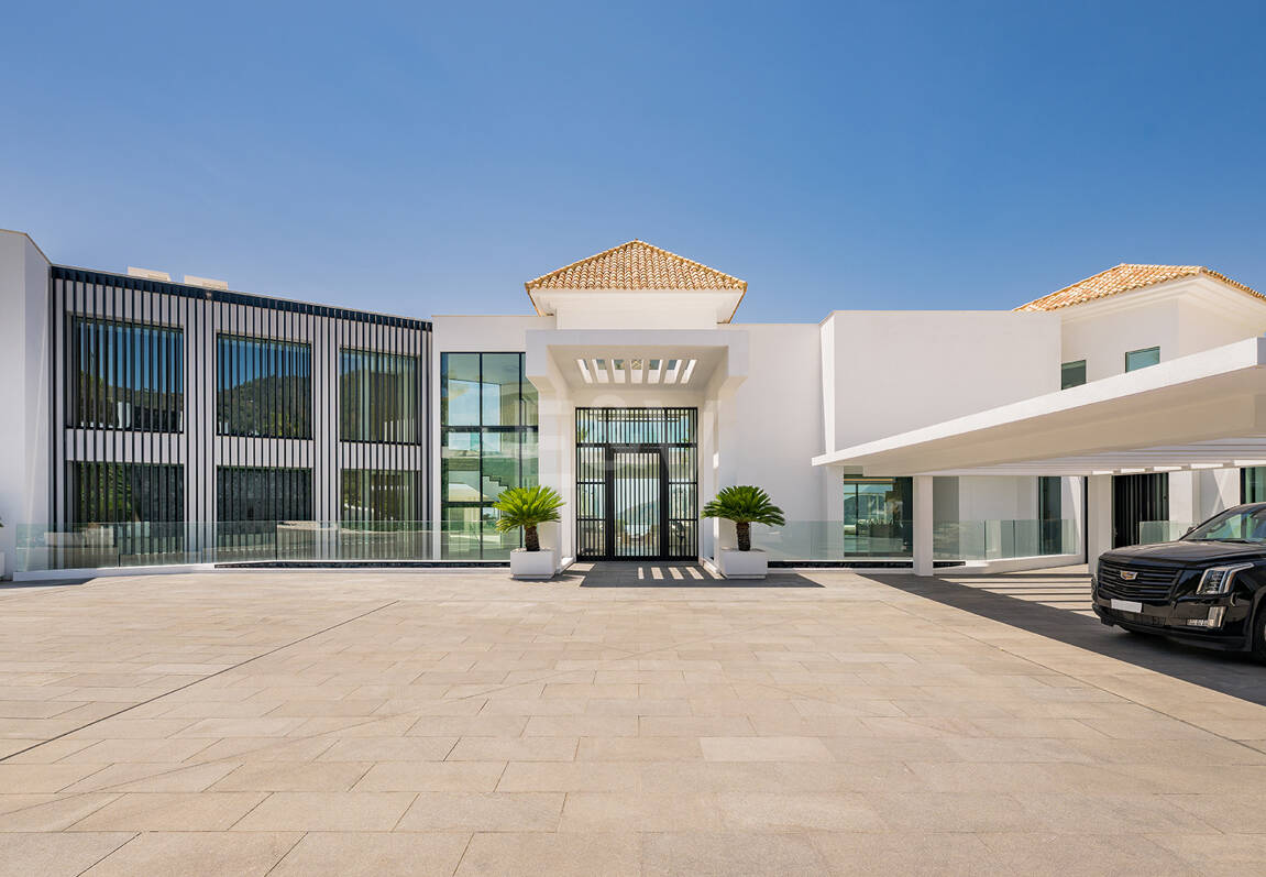 Architectural Masterpiece with Spectacular Sea and Mountain Views