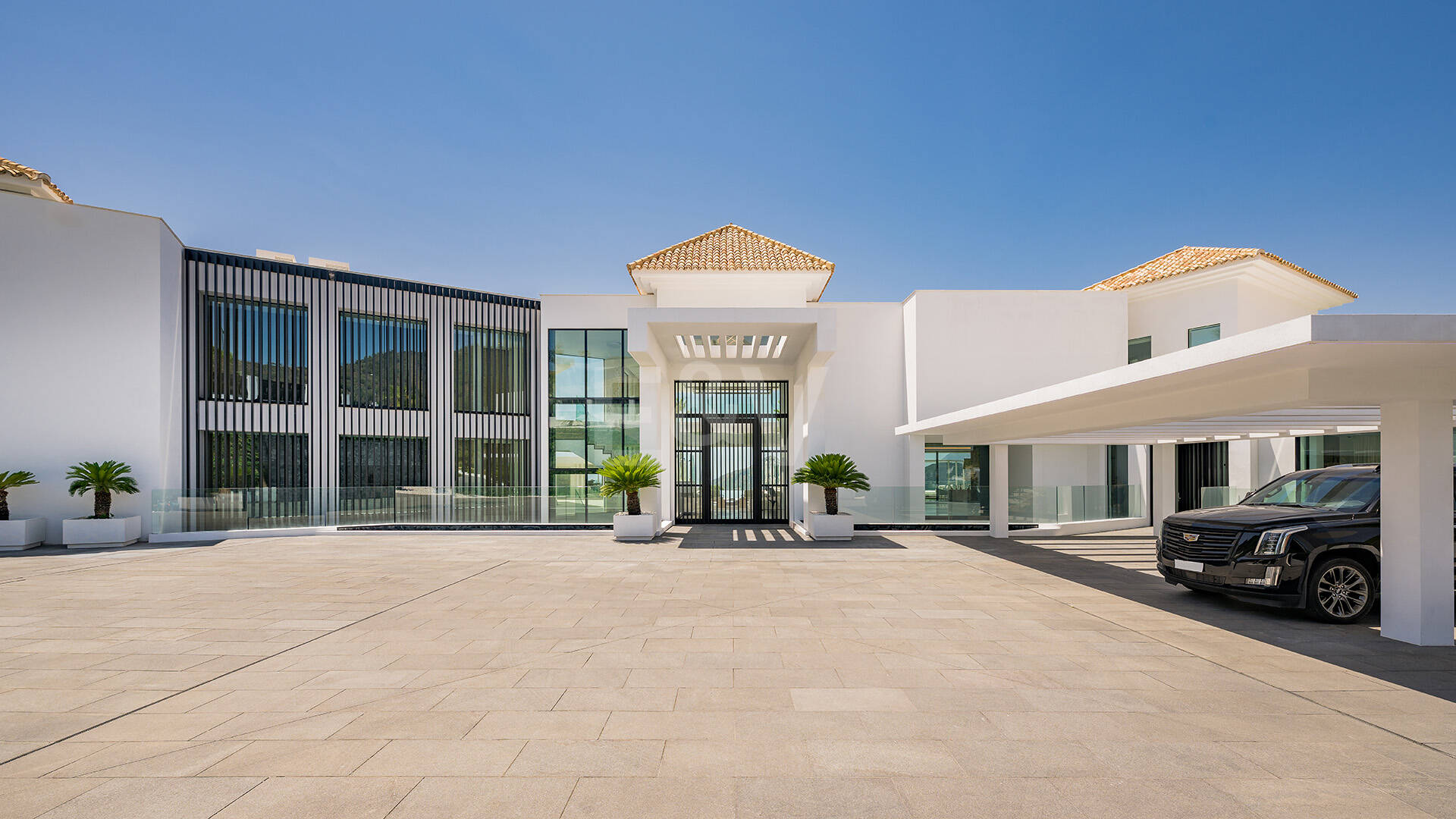 Architectural Masterpiece with Spectacular Sea and Mountain Views
