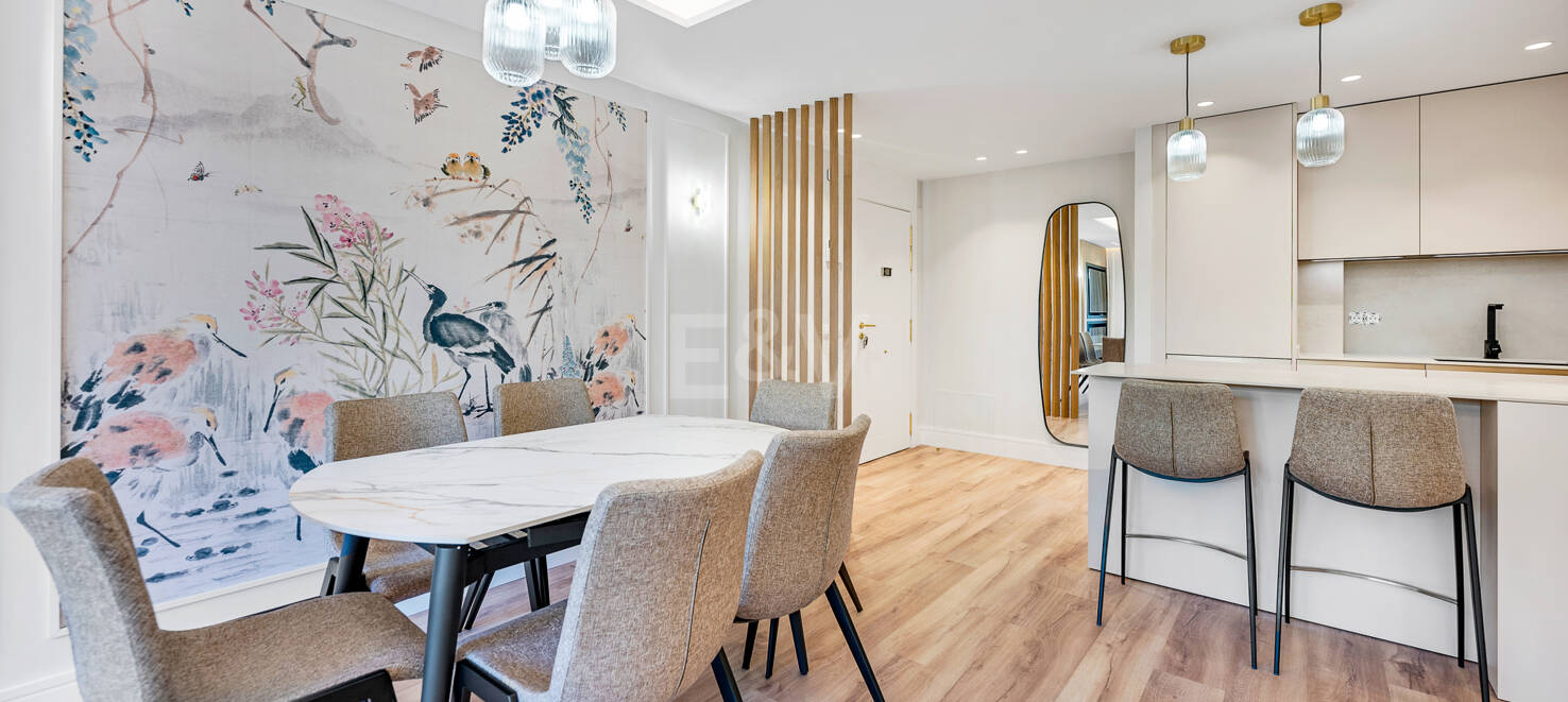 Apartamento moderno en planta baja con ubicación costera privilegiada