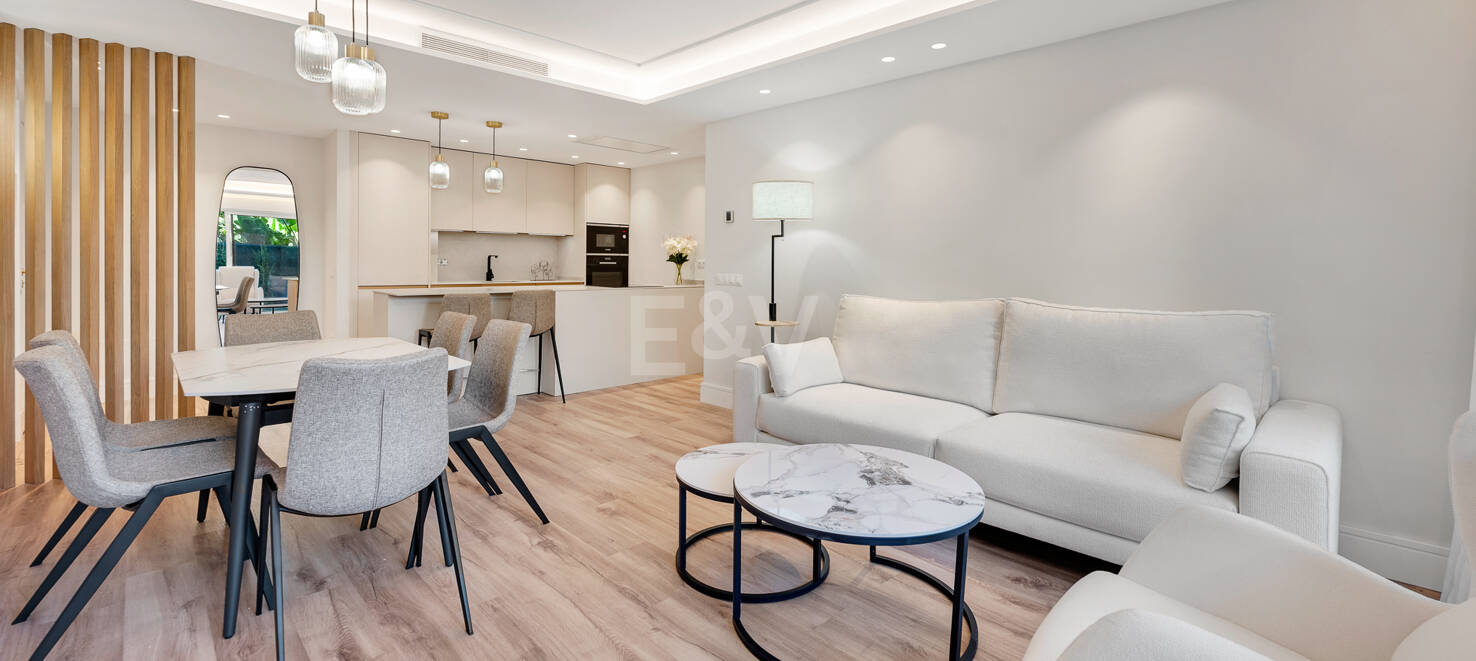 Apartamento moderno en planta baja con ubicación costera privilegiada