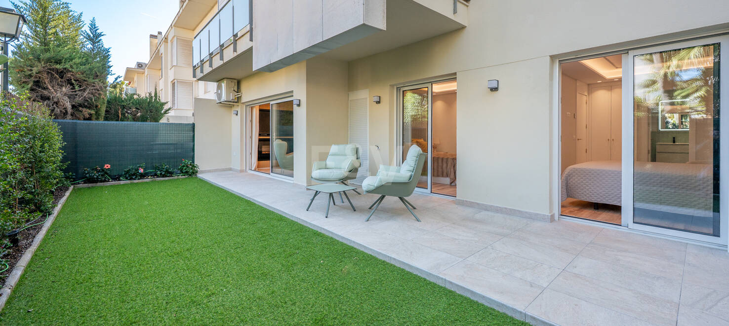 Apartamento moderno en planta baja con ubicación costera privilegiada