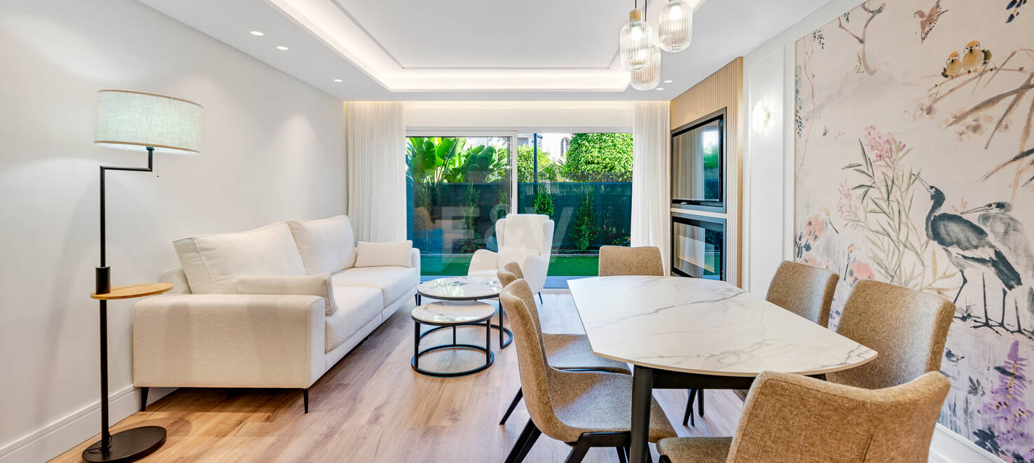 Apartamento moderno en planta baja con ubicación costera privilegiada