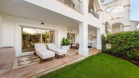 Elegante apartamento con jardín en una exclusiva comunidad cerrada