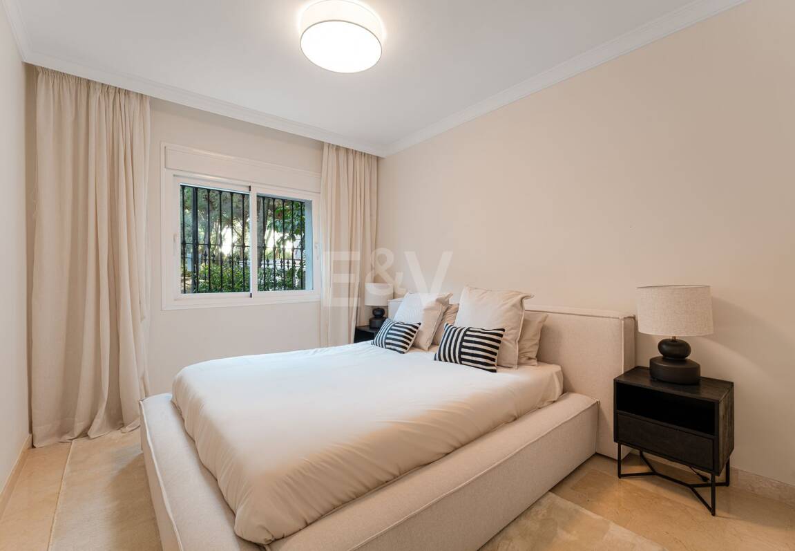 Elegante apartamento con jardín en una exclusiva comunidad cerrada