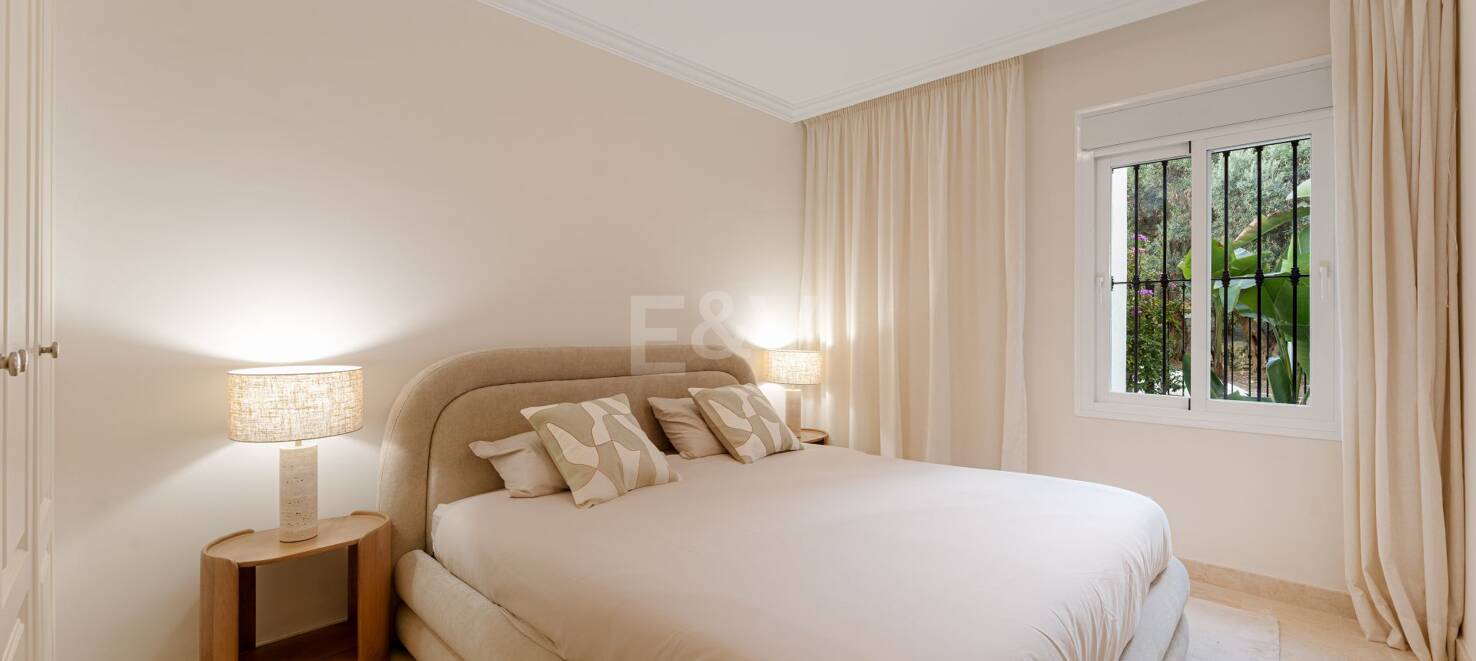 Elegante apartamento con jardín en una exclusiva comunidad cerrada