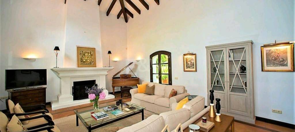Magnificent Andalusian-style villa available for long-term rental in a gated community with 24-hour security.