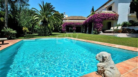 Magnificent Andalusian-style villa available for long-term rental in a gated community with 24-hour security.