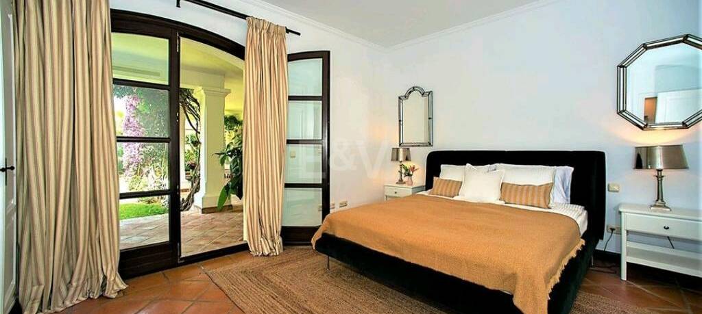 Magnificent Andalusian-style villa available for long-term rental in a gated community with 24-hour security.