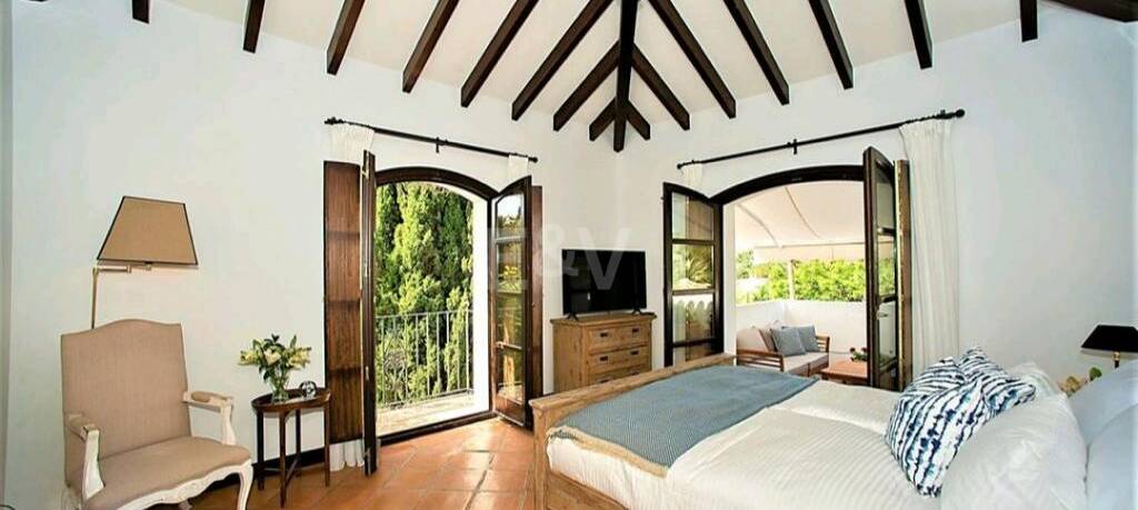 Magnificent Andalusian-style villa available for long-term rental in a gated community with 24-hour security.