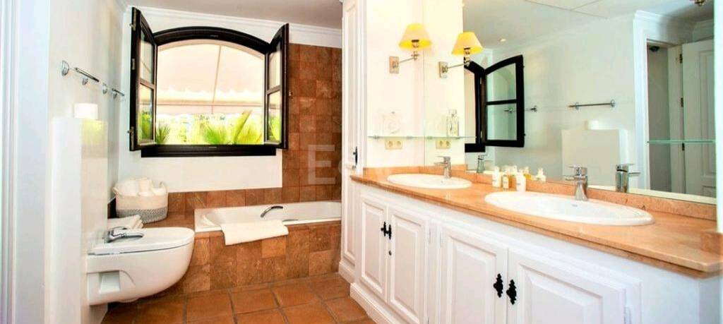 Magnificent Andalusian-style villa available for long-term rental in a gated community with 24-hour security.