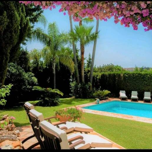 Magnificent Andalusian-style villa available for long-term rental in a gated community with 24-hour security.