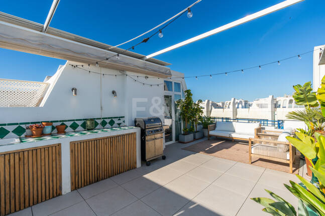 Penthouse with Sea Views Steps From the Beach