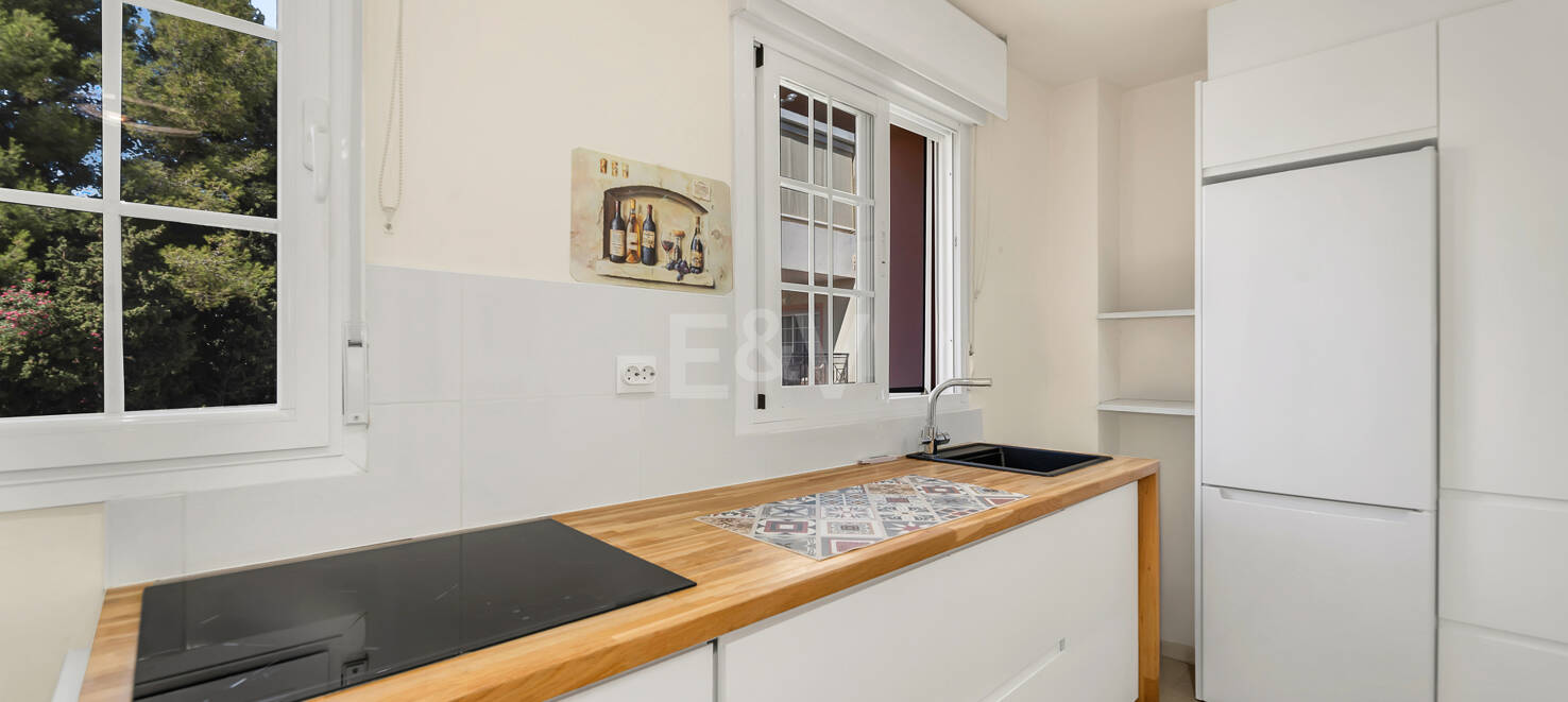 Renovated apartment with large corner terrace