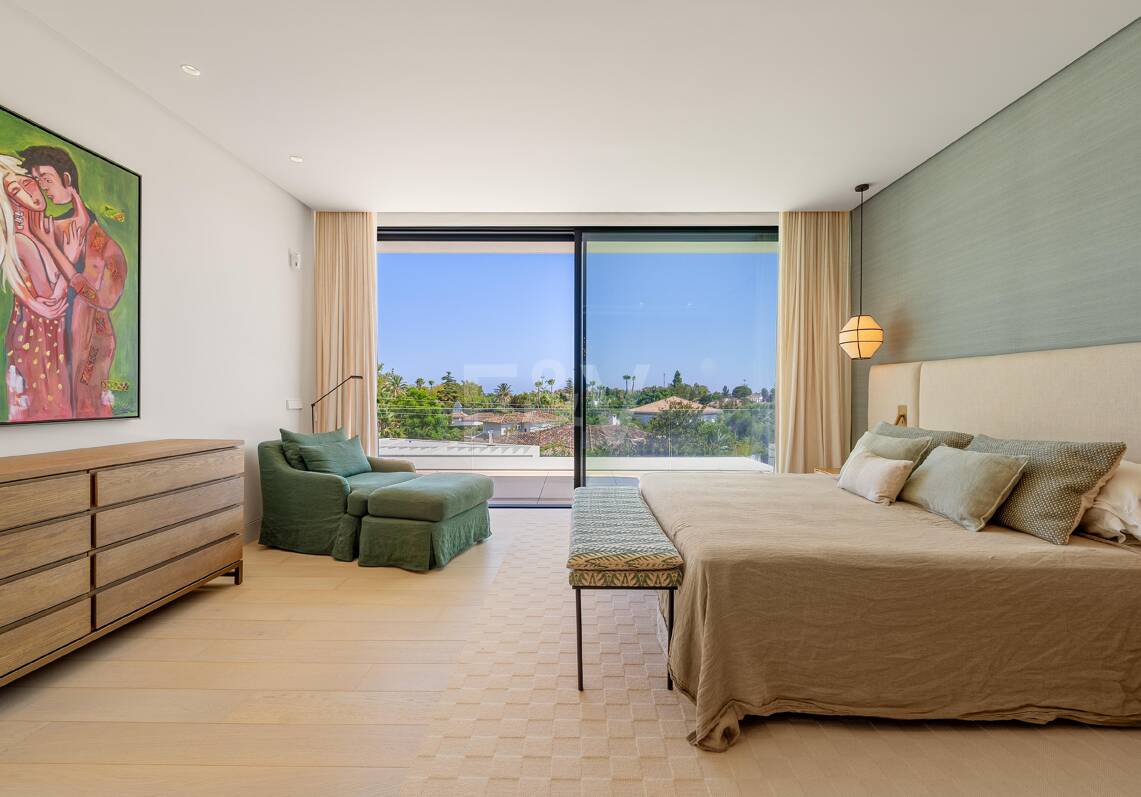 Grand Contemporary Villa with Luxury Amenities and Prime Golfside Living