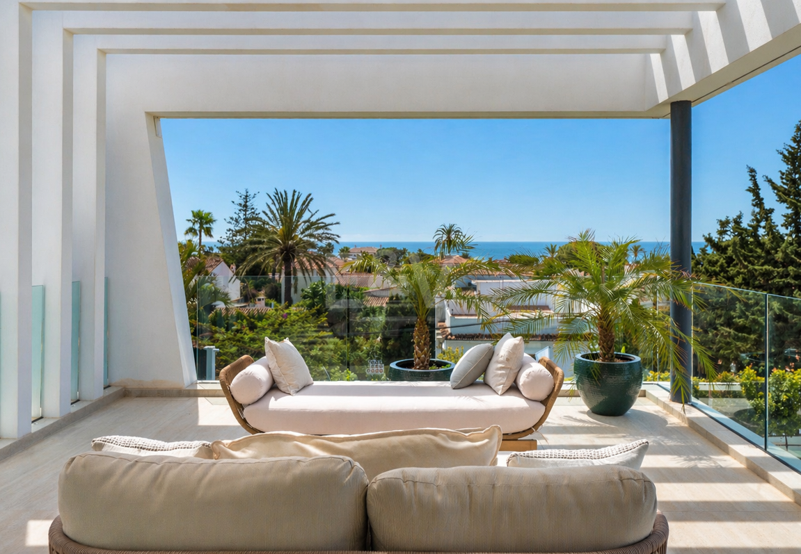 Villa junto a la playa con vistas al mar, solárium en azotea y zona de bienestar