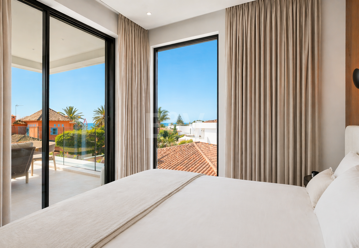 Villa junto a la playa con vistas al mar, solárium en azotea y zona de bienestar