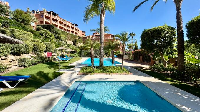 Exclusive Garden Apartment with Panoramic Sea and Golf Views