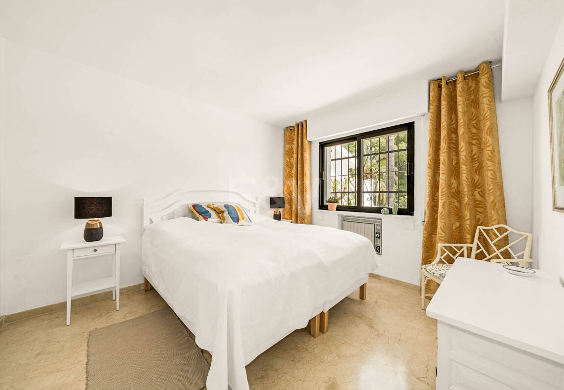 Rare Opportunity: Spacious Apartment with Garden, Pool & Sea Views